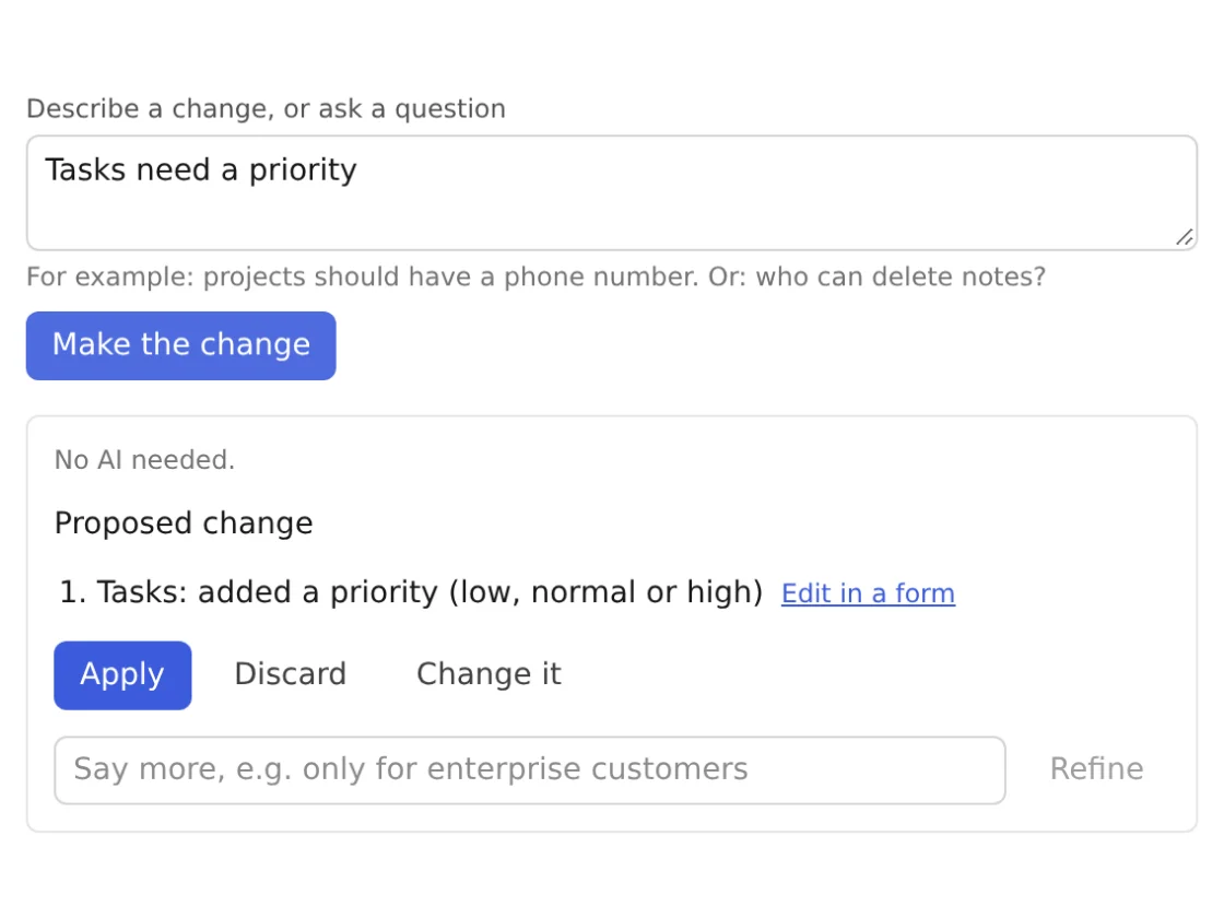 Studio's prompt box with "Tasks need a priority" and the change it proposes